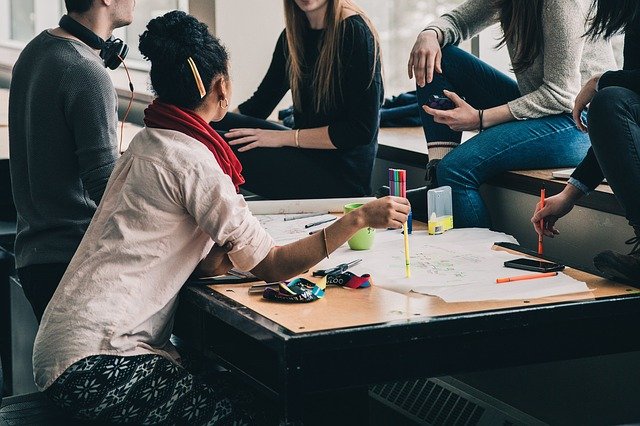 Students around table working