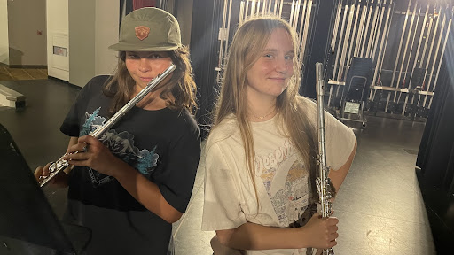 C. K. McClatchy musicians Marley Logan and Elizabeth Denton posing with their flutes. Photo by Kennedy OGilvie-Joplin, McClatchy High School.