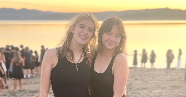 Folsom High seniors Jovie Carr, left, and Katelyn Bryan were among the hundreds of Folsom and Vista del Lago students who set aside their differences to participate in a joint Senior Sunrise celebration on Aug. 7 at Folsom Lake.  