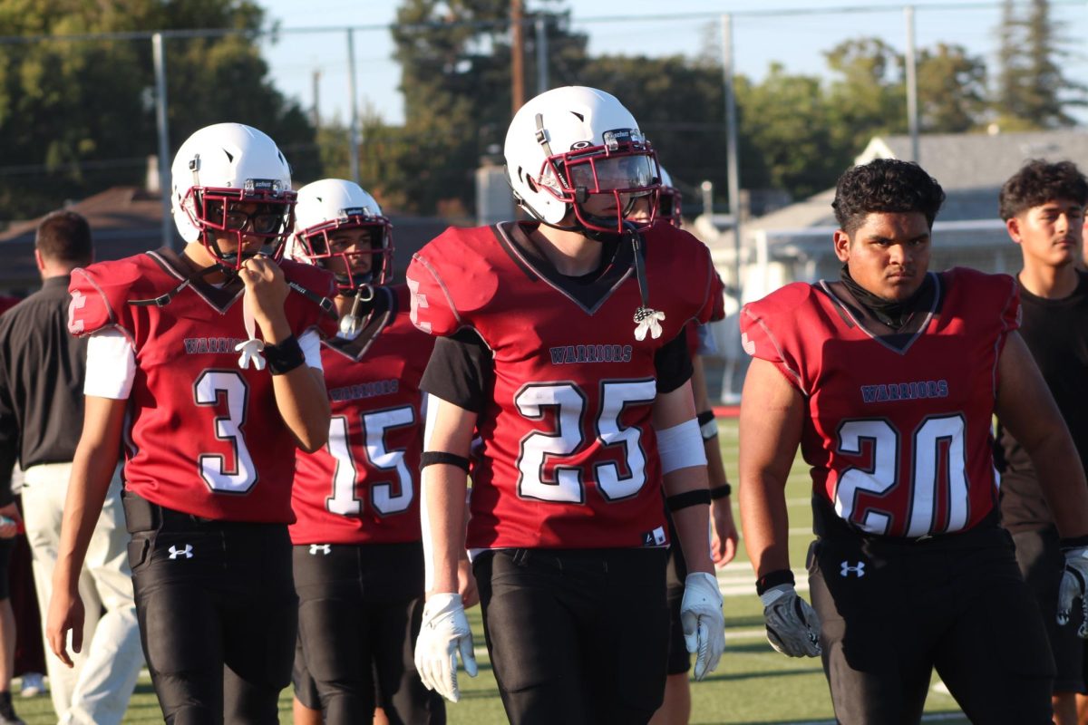 Omar Mendoza, Nikolye Hensley, Riley Gilson and Angel Mier, left to right, head to the huddle during a West Campus game earlier this season. // Photo by Jiaying (Jamie) Kuang